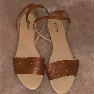 Brown flat sandal with strap